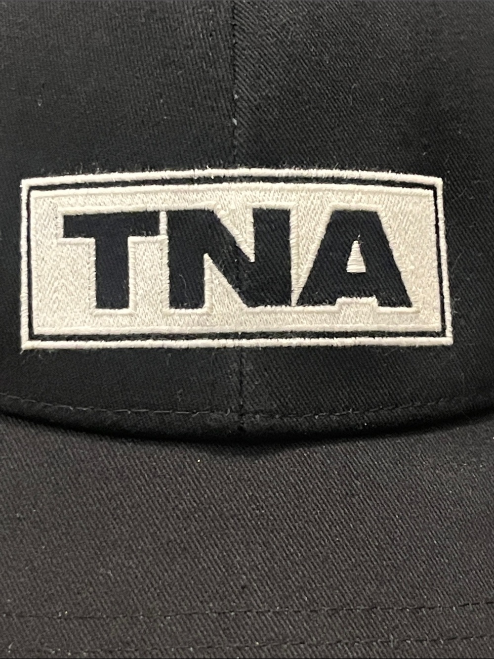 TNA Black Baseball Cap with White Logo Patch - Picture 2 of 8